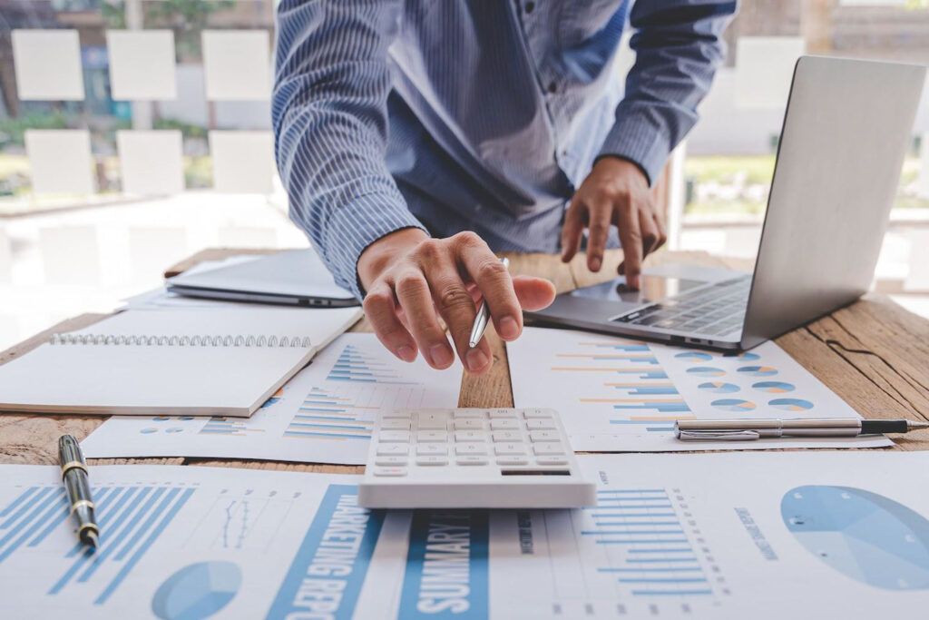 Business administrator analyzing fuel theft prevention and cash flow statistics.