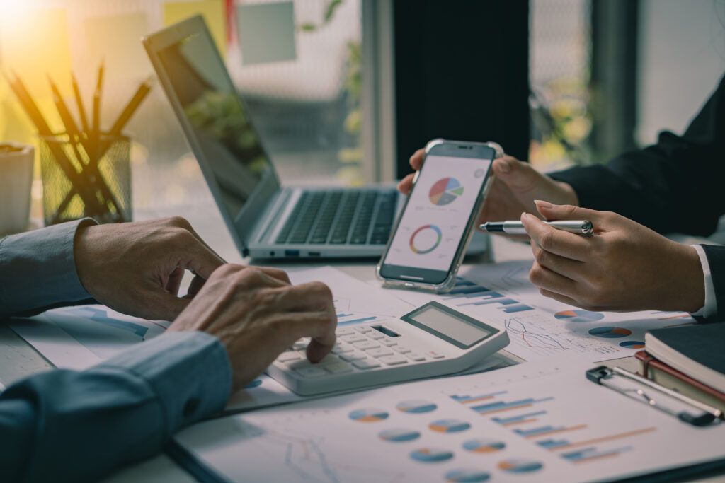 Cardholders consulting the accounting features of their fleet management software. 