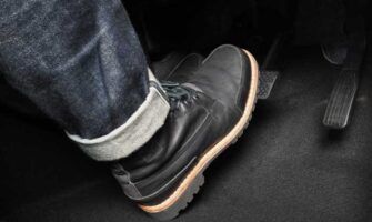 A truck driver’s boot as it presses the brake.