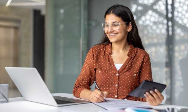 A business owner reviews her expense deductions from her fleet for tax purposes.