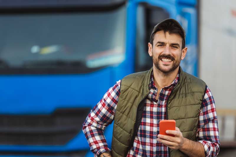 A fleet owner gets real-time alerts on his cell phone about purchases made by his fleet drivers.